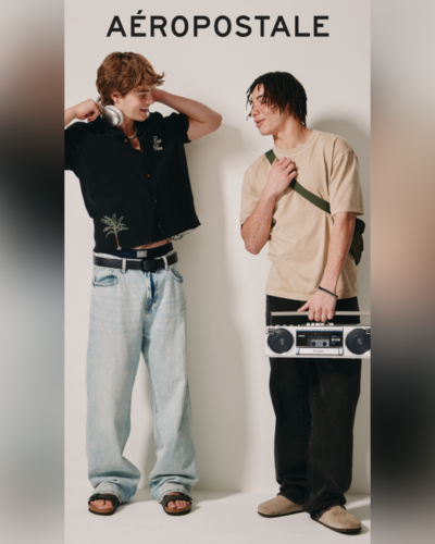 guys in jeans and t-shirts with boombox