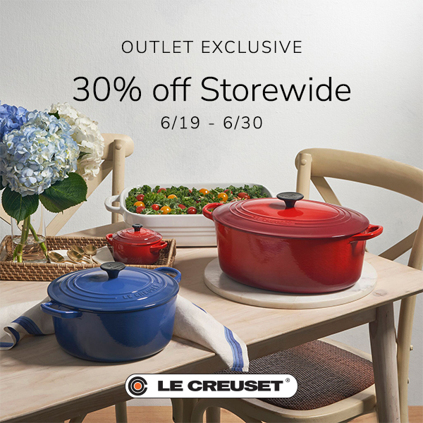 dining table with two Dutch ovens one blue one red