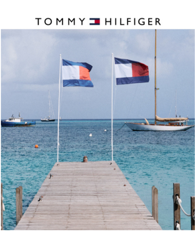 dock and boats in the water with flags