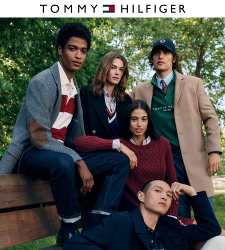 group of models in fall sweaters and light coats