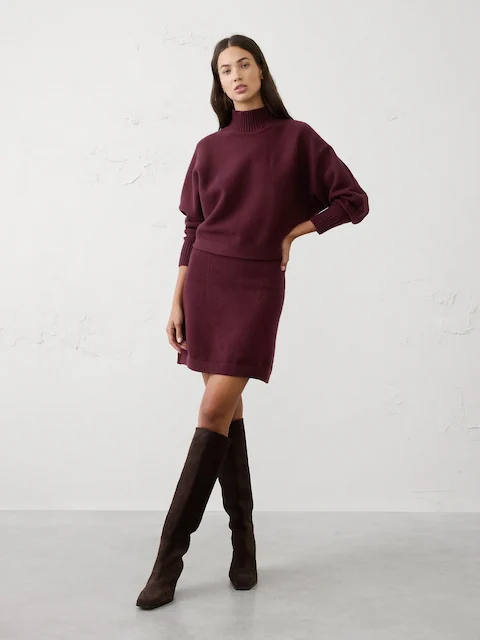 Woman Wearing Oversized Turtleneck Cropped Sweater 
