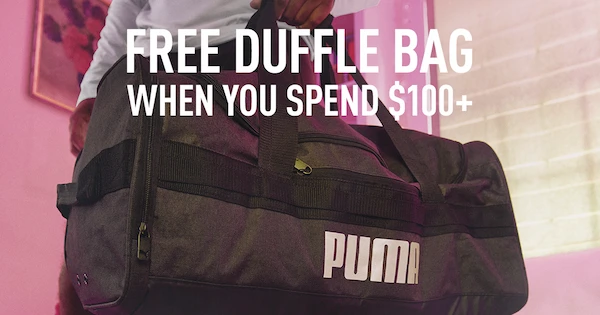 Woman Carrying Puma Duffle Bag Wide Photo