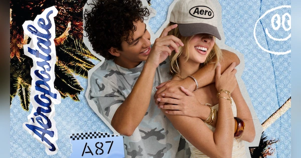 Man putting Aero hat on woman