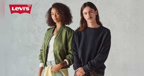 Man and woman wearing Levi's clothes posing
