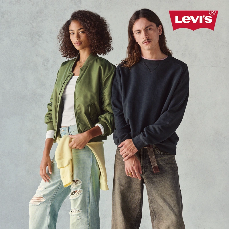 Man and woman wearing Levi's clothes posing
