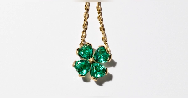 Pandora emerald necklace with gold chain close up