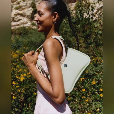 Woman wearing Kate Spade handbag