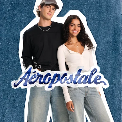 Man wearing black sweater and woman wearing white long sleeve from Aeropstale