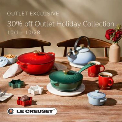 Le Creuset holiday cookware, kettle and mugs on a dining table