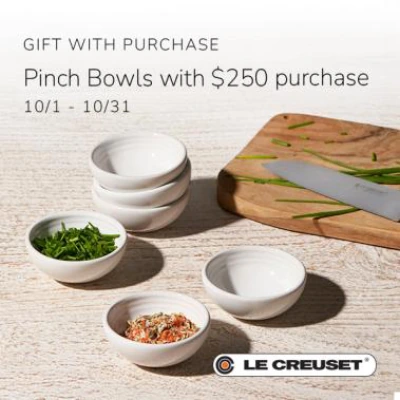 White Le Creuset pinch bowls with fresh herbs and spices